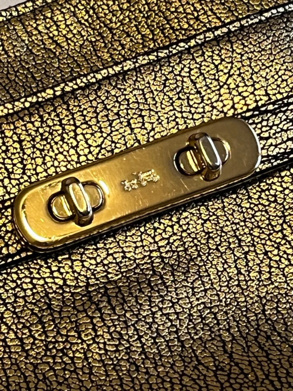 Coach Swagger Swingpack Metallic Gold Crossbody Bag with Turnlock Detail and bag